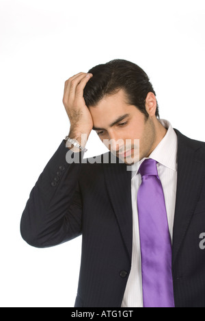 Deprimiert Geschäftsmann auf weißem Hintergrund Stockfoto