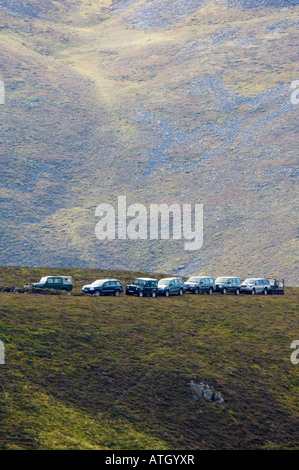 Allrad-Fahrzeuge, die Zugehörigkeit zu einer Jagdgesellschaft auf Grouse moor Stockfoto