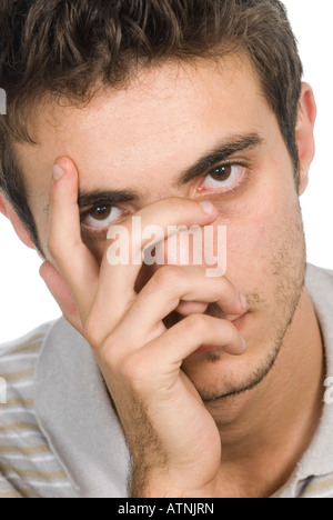 Junger Mann Hand bedeckte Gesicht Stockfoto