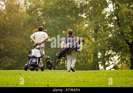 2 Spieler mit Buggy und Tasche Herbst Holz Stockfoto