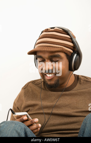 Mann mit MP3-Player. Stockfoto