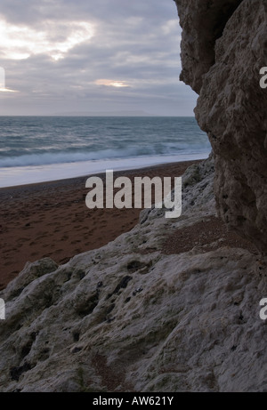 Sonnenuntergang am Strand von Durdle Door in der Nähe von Lulworth Cove Dorset Stockfoto