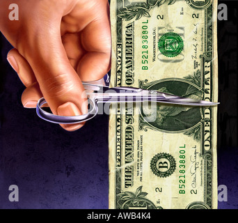 ein Dollar-Note durch Schere in der hand geschnitten Stockfoto
