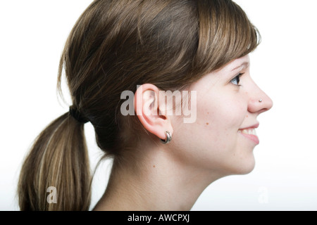 Porträt einer jungen Frau mit Pferdeschwanz, Profil Stockfoto