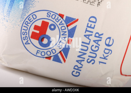 Lebensmittelkennzeichnung versichert Food Standard Logo-Design auf ein Paket von Kristallzucker Stockfoto