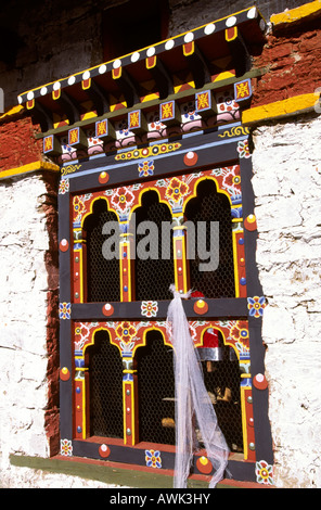 Bhutan Dorcho La Wasser angetriebene Gebetsmühle Fensterdetail Stockfoto