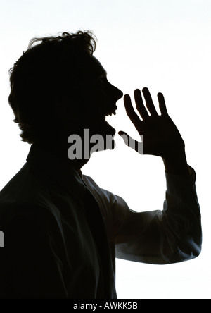 Mann mit Hand vor Mund schreien, silhouette Stockfoto