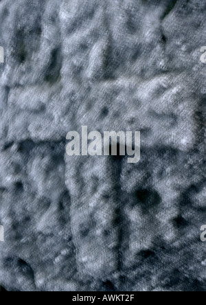 Kreuz eingraviert in Felsen, verschwommen, close-up Stockfoto