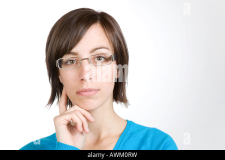 Junge Frau mit Brille Stockfoto