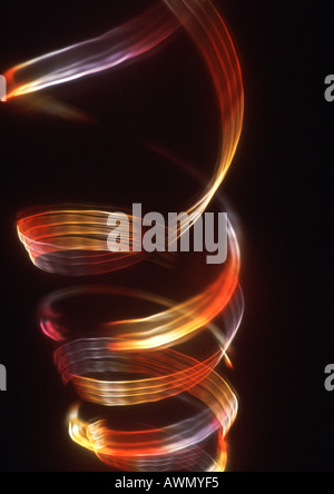 Spiralförmig Lichteffekt, rot- und Gelbtöne. Stockfoto
