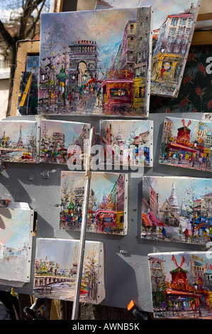 Frankreich Paris Butte Montmartre Place du Tertre Maler bei Arbeiten an typischen Blick auf Paris mit Gemälden auf Staffelei in frgd Stockfoto