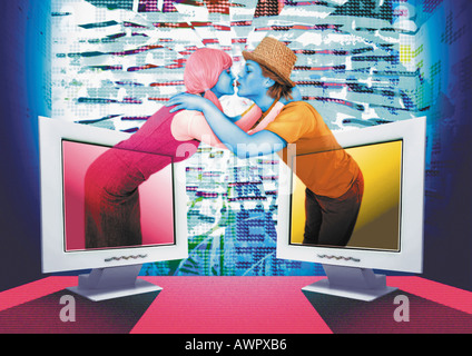 Mann und Frau jeweils entstehende ein Computerbildschirm, küssen einander, digital composite Stockfoto