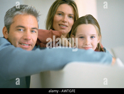 Familie sitzen zusammen, Porträt Stockfoto