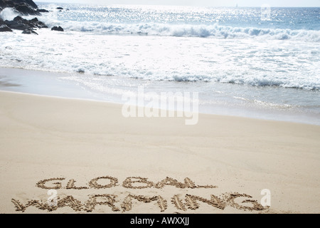 Die globale Erwärmung in Strand, erhöhten Blick geschriebener text Stockfoto