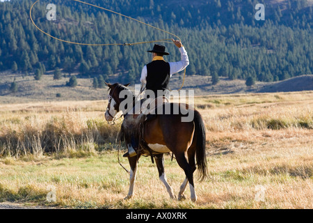 Cowboy Reiten und Lasso Wildwest, Oregon USA werfen Stockfoto