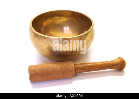 Traditionelle tibetische Klangschale und Holzhammer Stockfoto