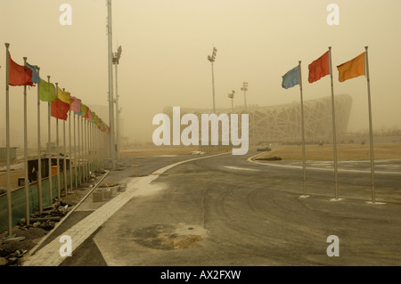 Schwerer Sandsturm trifft Baustelle des Nationalstadion für die Olympischen Spiele 2008 in Peking. 18. März 2008 Stockfoto