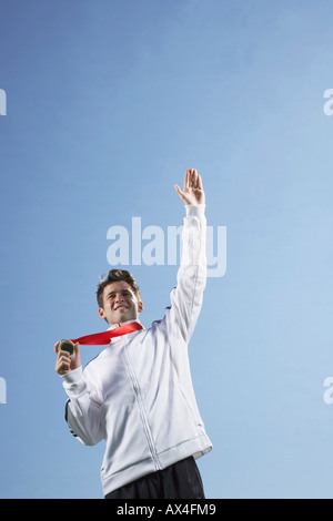 Mann mit Medaille Stockfoto