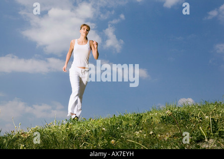 Junge Frau, Joggen Stockfoto