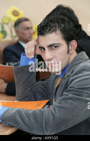 Porträt eines Geschäftsmannes, sitzen in einem meeting Stockfoto