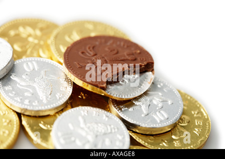 Schokolade Geld essen Ihre Ersparnisse Stockfoto