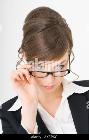 Geschäftsfrau mit Brille Stockfoto