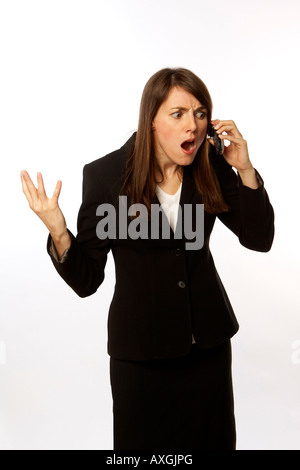 Wütend Geschäftsfrau auf Handy Stockfoto