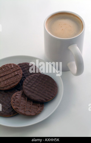 Kaffeepause mit Schokoladenkekse Stockfoto