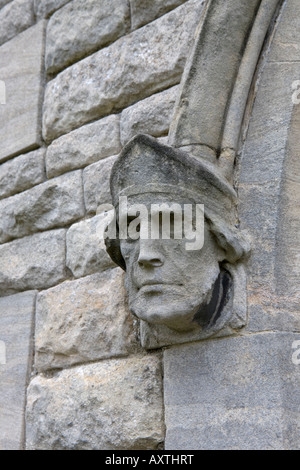 Ein stern Wasserspeier eines Gesichts auf der Tür der Kirche in Spilsby Lincolnshire Stockfoto