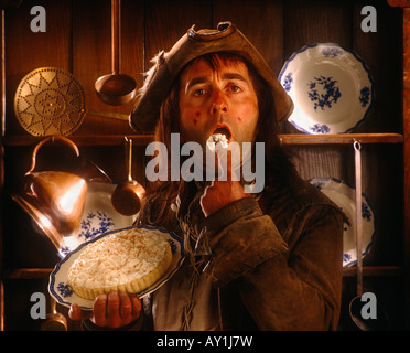 Baldrick (Tony Robinson) mit roten Flan/Merangue Zitronenkuchen Stockfoto