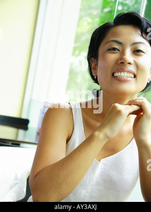 Porträt einer jungen Frau, Lächeln Stockfoto
