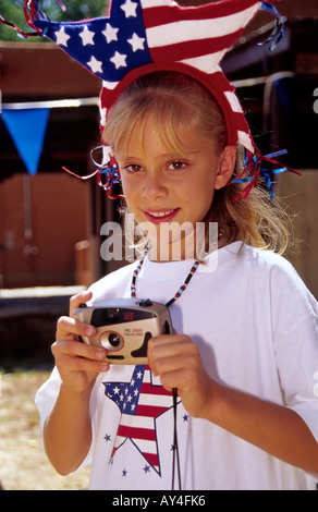 Herr 624 Kamera klicken Erin Wilson nimmt einige Schnappschüsse vom 4. Juli Parade in Capitan, New Mexico. Stockfoto