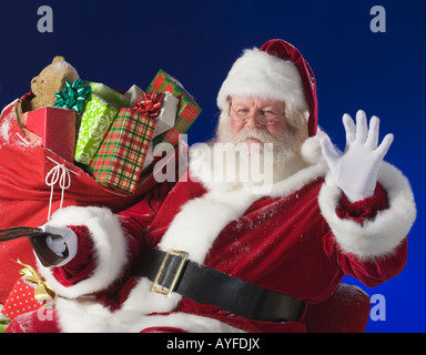 Santa Claus neben dem Spielzeug Tasche Stockfoto