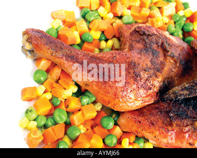 Halbes Haehnchen Auf Mischgemuese Stockfoto