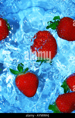 Juicy strawberries being cleaned Stockfoto