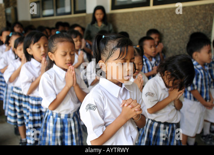 Indonesien: Schüler an christliche Schoolprayer an der katholischen Schule in Makassar (Ujung Padang) Stockfoto