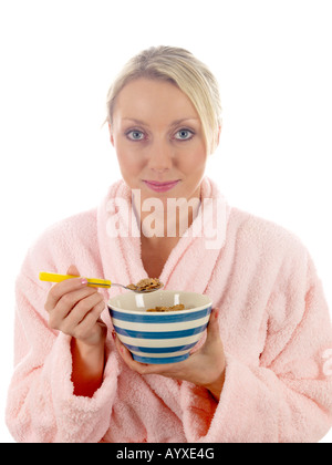 Junge Frau essen Müsli-Modell veröffentlicht Stockfoto