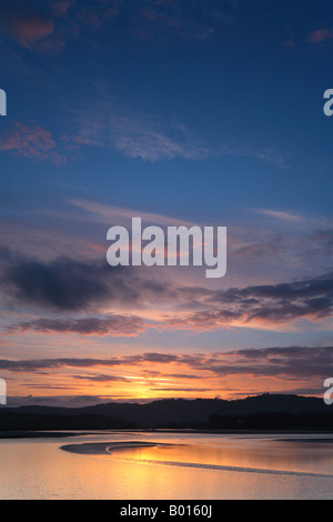 'Sunrise' über die Mündung des Flusses Leven, in der Nähe von Greenodd, Lake District. Stockfoto