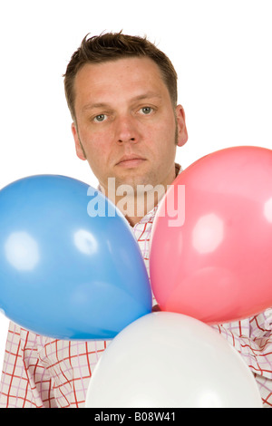 40 Jahre alten Mann mit Luftballons, ernst Stockfoto