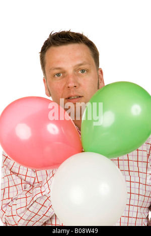 40 Jahre alten Mann mit Luftballons Stockfoto