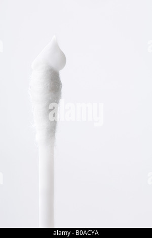 Wattestäbchen mit Schlag Sahne, Nahaufnahme Stockfoto