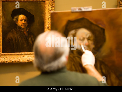 Metropolitan Art Museum und Kunstgalerie Interieur mit alten männlichen Maler kopieren ein Selbstporträt von Rembrandt-New York City-NY Stockfoto