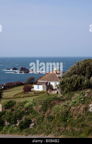 Die Küste und die SÜDLICHSTEN HAUS IN GROSSBRITANNIEN AN LIZARD HEAD an der Küste von Cornwall. CORNWALL ENGLAND. Stockfoto