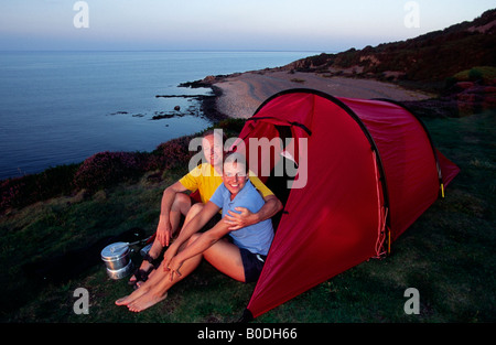 Camping paar in Skane bei Sonnenuntergang Stockfoto