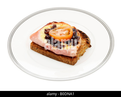 Käse, Schinken und Gurke auf Toast Stockfoto