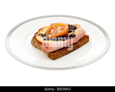 Käse, Schinken und Gurke auf Toast Stockfoto