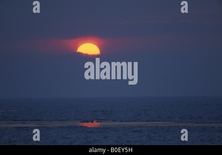 Treibeis und der untergehenden Sonne Stockfoto