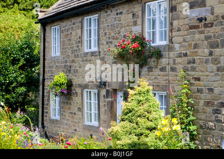 Zwei der Pest Cottages in der Church Street in Eyam ein Dorf im Peak District in Derbyshire Stockfoto