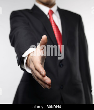 Unternehmer zur Verlängerung der Hand für Handshake Stockfoto