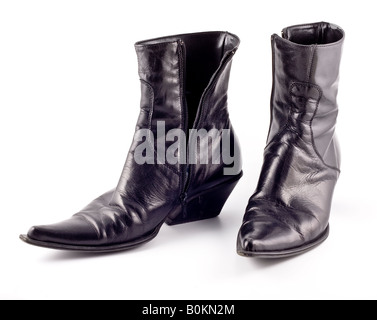 gut genutzte weibliche Stiefel Stockfoto